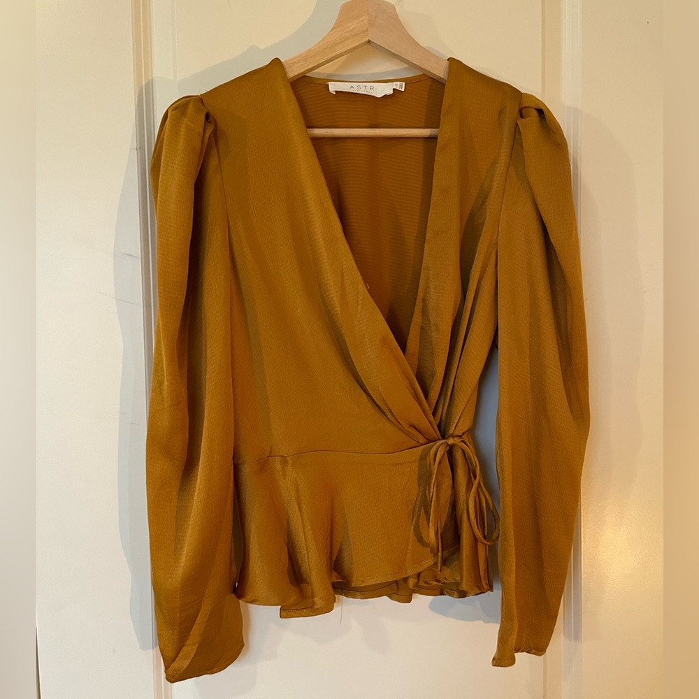 Astr gold peplum wrap blouse